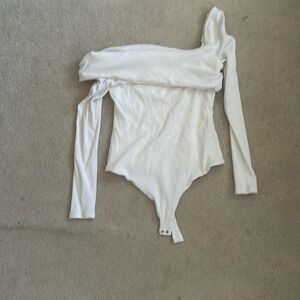 Cream off the shoulder bodysuit perfect for a night out or a casual outing